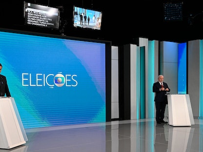 الرئيس البرازيلي جايير بولسونارو ومنافسه المرشح اليساري لويس إيناسيو لولا دا سيلفا خلال مناظرة تلفزيونية في ريو دي جانيرو، البرازيل- 28 أكتوبر 2022 - AFP