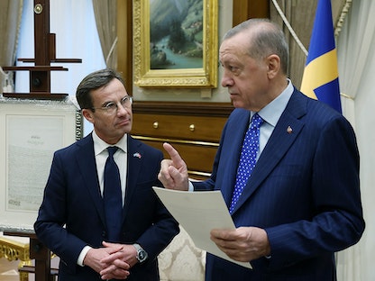 الرئيس التركي رجب طيب أردوغان مع رئيس الوزراء السويدي أولف كريسترسون في أنقرة - 08 نوفمبر 2022 - REUTERS