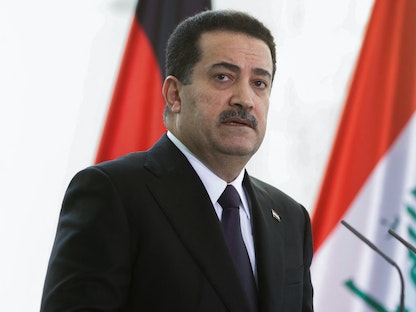 رئيس الوزراء العراقي محمد شياع السوداني خلال زيارته إلى برلين - 13 يناير 2023 - REUTERS
