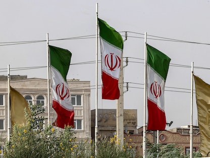 أعلام إيران في العاصمة طهران - AFP