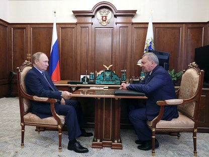 الرئيس الروسي فلاديمير بوتين ورئيس وكالة الفضاء الروسية يوري بوريسوف في موسكو- 26 يوليو 2022 - via REUTERS