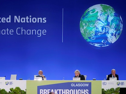 الرئيس الأميركي جو بايدن ورئيسا الوزراء البريطاني بوريس جونسون والهندي ناريندرا مودي خلال فاعليات قمة الأمم المتحدة للمناخ في جلاسكو الاسكتلندية - 2 نوفمبر 2021 - AFP