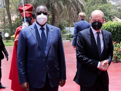 الرئيس السنغالي ماكي سال يستقبل المستشار الألماني أولاف شولتز في القصر الرئاسي بالعاصمة داكار- 22 مايو 2022 - REUTERS