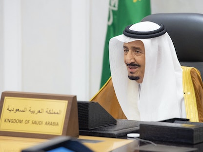 الملك سلمان يتحدث عن بُعد في قمة مجموعة العشرين - الرياض - 30 أكتوبر 2021 - AFP
