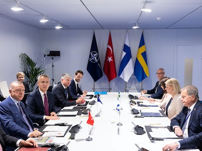 جانب من المحادثات التي جمعت تركيا وفنلندا والسويد في مدريد. 28 يونيو 2022. - via REUTERS