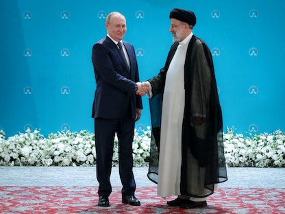 الرئيس الروسي فلاديمير بوتين ونظيره الإيراني إبراهيم رئيسي في طهران- 19 يوليو 2022 - REUTERS