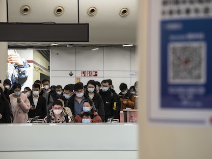 ركاب في محطة لمترو الأنفاق في شنغهاي، الصين. 5 ديسمبر 2022 - Bloomberg