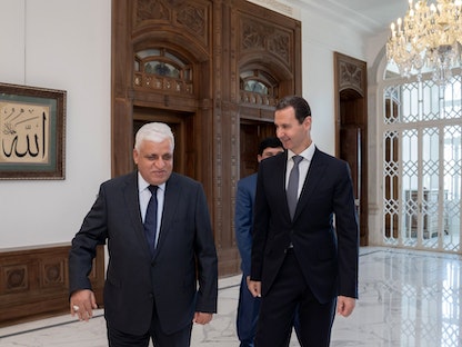الرئيس السوري بشار الأسد خلال استقباله رئيس هيئة الحشد الشعبي فالح الفياض في دمشق - 16 أغسطس 2021. - twitter/Presidency