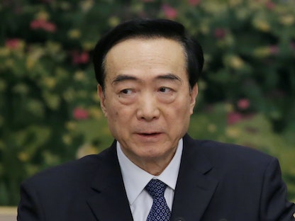 تشين تشيوانجو أمين الحزب الشيوعي لمنطقة شينجيانج في اجتماع ببكين، 13 سبتمبر 2021 - REUTERS