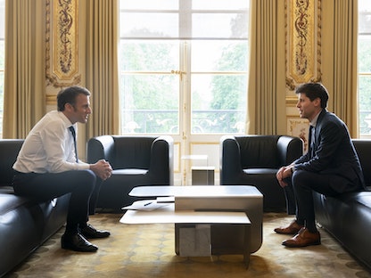الرئيس الفرنسي إيمانويل ماكرون يستقبل المؤسس والرئيس التنفيذي لشركة ChatGPT سام ألتمان في باريس. 23 مايو 2023 - Twitter@EmmanuelMacron