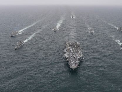 حاملة الطائرات الأميركية "نيميتز" تشارك إلى جانب البحرية الكورية الجنوبية في تداريب مشتركة في المياه الدولية قبالة جزيرة جيجو. 4 أبريل 2023 - AFP