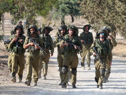قوات إسرائيلية في مكان غير محدد على حدود قطاع غزة. 19 أكتوبر 2023 - AFP