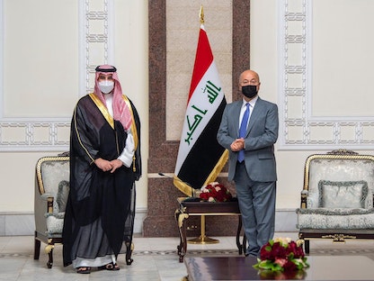 نائب وزير الدفاع السعودي الأمير خالد بن سلمان، خلال لقائه الرئيس العراقي برهم صالح في العاصمة بغداد - twitter.com/@kbsalsaud