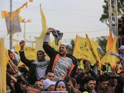 أنصار لحركة فتح يحتفلون بذكرى تأسيسها الـ55 في غزة. 1 يناير 2020. - Getty Images