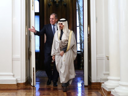 وزير الخارجية الروسي سيرغي لافروف برفقو وزير الخارجية السعودي الأمير فيصل بن فرحان في العاصمة الروسية موسكو - 14 يناير 2021 - via REUTERS