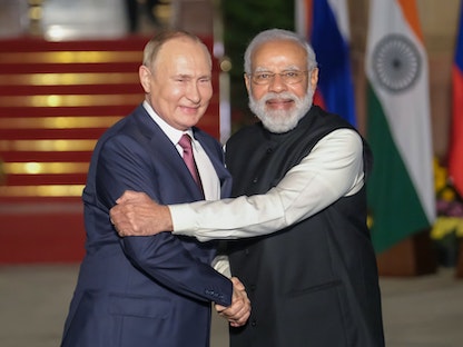 رئيس وزراء الهندي ناريندرا مودي والرئيس الروسي فلاديمير بوتين في نيودلهي - 6 ديسمبر 2021 - Bloomberg