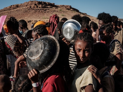 إثيوبيون فروا من صراع تيغراي إلى مخيم أم راكوبة للاجئين في ولاية القضارف شرق السودان، 12 ديسمبر 2020 - AFP