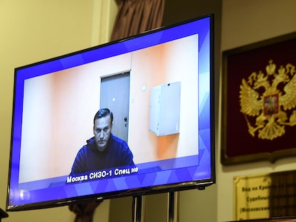 المعارض الروسي أليكسي نافالني في بث مباشر داخل قاعة محكمة استئناف- 28 يناير 2021. - AFP