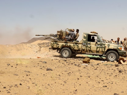 قوات تابعة للحكومة اليمنية خلال مواجهات مع الحوثيين في مأرب. مارس 2021 - REUTERS