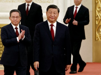 الرئيس الصيني شي جين بينج وخلفه أعضاء اللجنة الدائمة للمكتب السياسي الجديد بعد المؤتمر الوطني العشرين للحزب الشيوعي الصيني- 23 أكتوبر 2022.  - REUTERS