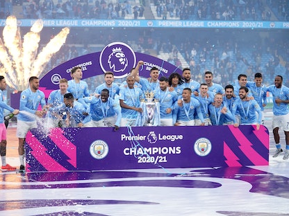 من احتفالات مانشستر سيتي بلقب الدوري الإنجليزي الممتاز في الموسم الماضي - Pool via REUTERS