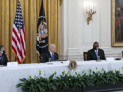 الرئيس الأميركي جو بايدن في أول اجتماع بوزراء إدارته منذ توليه المنصب في 20 يناير الماضي 2021 - Bloomberg