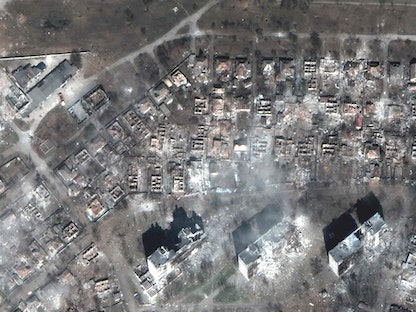 صور أقمار اصطناعية جديدة لشركة "ماكسار تكنولوجيز" تظهر تدمير مجمعات سكنية كاملة وسط ماريوبْل  - AFP