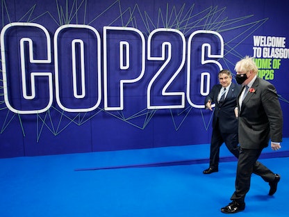 رئيس الوزراء البريطاني بوريس جونسون يصل إلى مؤتمر الأمم المتحدة لتغير المناخ (COP26) في جلاسكو. بريطانيا في 1 نوفمبر 2021.  - REUTERS