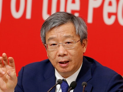 محافظ البنك المركزي في الصين يي جانج خلال مؤتمر صحافي حول التنمية الاقتصادية للصين في بكين، 24 سبتمبر 2019 - REUTERS