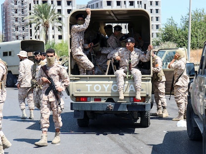 عناصر اللواء 444 الموالي لرئيس الحكومة المقالة من البرلمان عبد الحميد الدبيبة في طرابلس- 22 يوليو 2022 - REUTERS