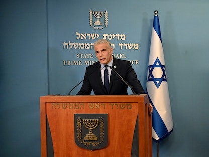 رئيس الوزراء الإسرائيلي يائير لبيد خلال مؤتمر صحافي في القدس. 24 أغسطس 2022 - UPI