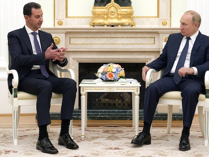 الرئيس الروسي فلاديمير بوتين يلتقي الرئيس السوري بشار الأسد في الكرملين - موسكو - 13 سبتمبر 2021 - via REUTERS