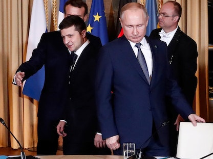 الرئيس الروسي فلاديمير بوتين، والرئيس الأوكراني فولوديمير زيلينسكيخلال قمة في باريس - 9 ديسمبر 2019 - AFP