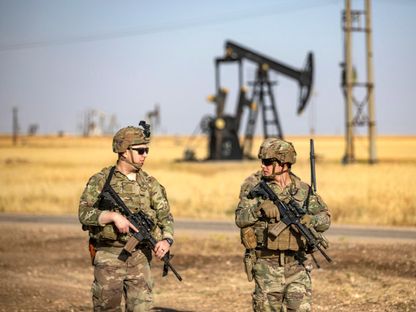 دورية للقوات الأمريكية بالقرب من بئر نفط في محافظة الحسكة شمال شرقي سوريا. 14 يونيو 2023 - AFP