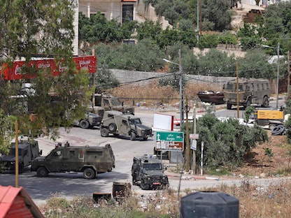 قوات الاحتلال الإسرائيلي خلال اشتباكات مع فلسطينيين في جنين بالضفة الغربية. 13 مايو 2022 - AFP