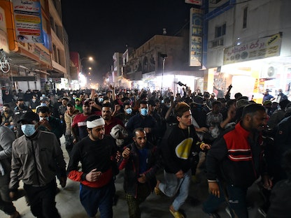 جانب من المظاهرات العراقية المطالبة بإقالة محافظ ذي قار ناظم الوائلي - AFP