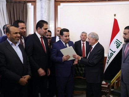 الرئيس العراقي المنتخب عبد اللطيف رشيد خلال تكليفه محمد شياع السوداني تشكيل الحكومة في بغداد- 13 أكتوبر 2022  - via REUTERS
