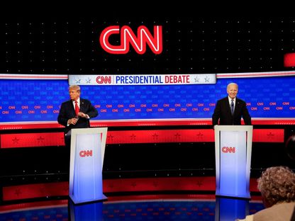 الرئيسان الأميركيان الحالي جو بايدن والسابق دونالد ترمب في أول مناظرة رئاسية في أتلانتا بولاية جورجيا الأميركية. 28 يونيو 2024 - REUTERS