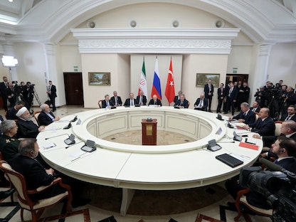 قمة في سوتشي جمعت قادة دول روسيا وإيران وتركيا - 14 فبراير 2019 - REUTERS