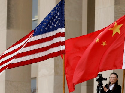 علمان أميركي وصيني في البنتاغون - فيرجينيا - 9 نوفمبر  2018 - REUTERS