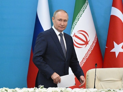 الرئيس الروسي فلاديمير بوتين خلال حضوره المؤتمر الصحافي المشترك في ختام القمة الثلاثية بين إيران وتركيا وروسيا بطهران-19 يوليو 2022 - AFP