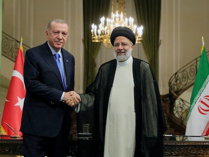 الرئيس الإيراني إبراهيم رئيسي يستقبل نظيره التركي رجب طيب أردوغان في العاصمة الإيرانية طهران- 19 يوليو 2022 - REUTERS