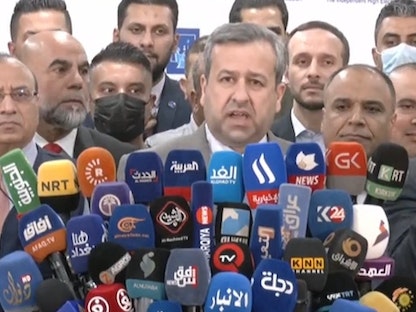 رئيس مجلس المفوضين، جليل عدنان، خلال مؤتمر الصحافي، عقب انتهاء التصويت في الانتخابات العراقية المبكرة - وكالة الأنباء العراقية