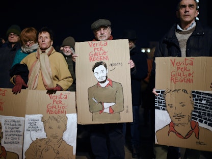 متظاهرون في تورين بإيطاليا يحيون الذكرى الرابعة لوفاة الطالب جوليو ريجيني، يناير 2020  - AFP