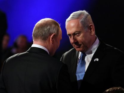 الرئيس الروسي فلاديمير بوتين ورئيس الوزراء الإسرائيلي بنيامين نتنياهو خلال لقاء في القدس- 23 يناير 2020 - Reuters