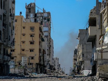 صورة تظهر الدمار الذي خلفته ضربات إسرائيلية سابقة في مدينة غزة. 25 مارس 2024 - AFP