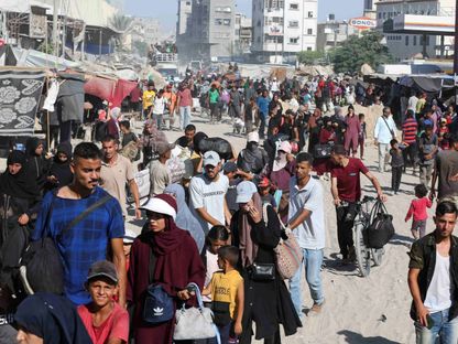 فلسطينيون ينزحون من خان يونس جنوب قطاع غزة بعد أمر إخلاء من الجيش الإسرائيلي. 8 أغسطس 2024 - REUTERS