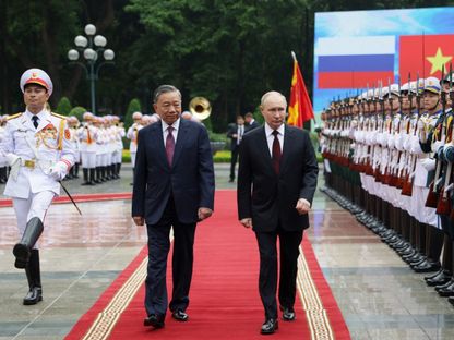 رئيس فيتنام تو لام يستقبل الرئيس الروسي فلاديمير بوتين في هانوي. 20 يونيو 2024 - REUTERS