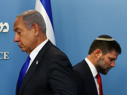 رئيس الوزراء الإسرائيلي بنيامين نتنياهو ووزير المالية بتسلئيل سموتريتش خلال مؤتمر صحافي في القدس. 11 يناير 2023 - Reuters