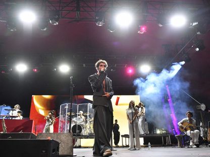 مغني الراب سان لوفان على مسرح جوبي، في مهرجان كوتشيلا فالي للموسيقى والفنون، إنديو، كاليفورنيا، 13 أبريل 2024 . - AFP